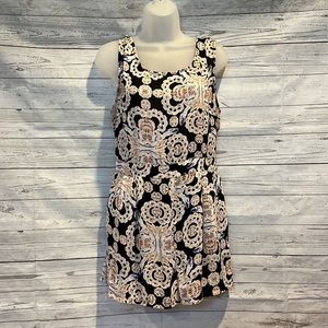 Forever 21 Contemporary romper in a black and blush pattern. Size L 🌸🖤